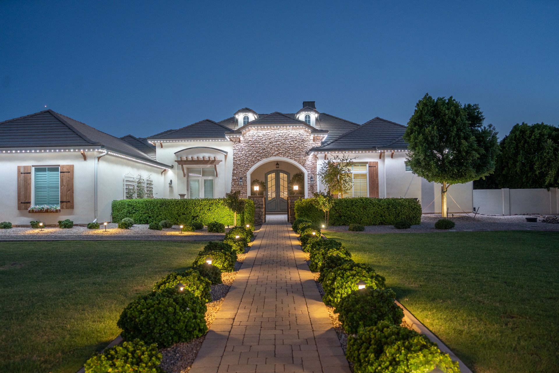 Home lit with Brite Bird at dusk